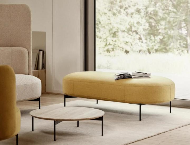 Pouf JOE Softline dans un espace lounge contemporain.