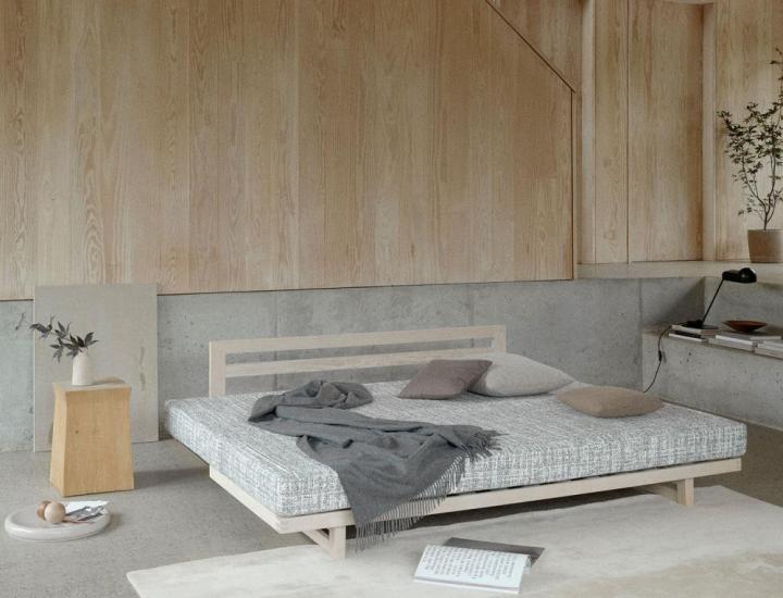 Canapé-lit ZENZO Softline déployé dans un intérieur premium et apaisant.